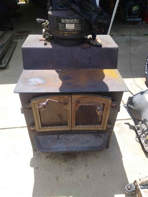 Wood Stove with Cast Iron Legs & Blower. . Fisher wood stove glass doors